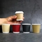 La aduana aislada caliente disponible de la taza de papel imprimió las tazas de papel del chocolate del café
